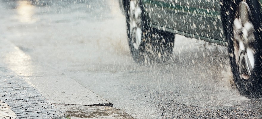 Car-Tires-Going-Through-Rain-Puddles Car-Tires-Going-Through-Rain-Puddles