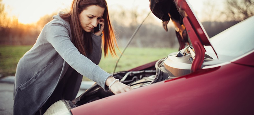 Woman-Standing-Over-Broken-Down-Car Woman-Standing-Over-Broken-Down-Car
