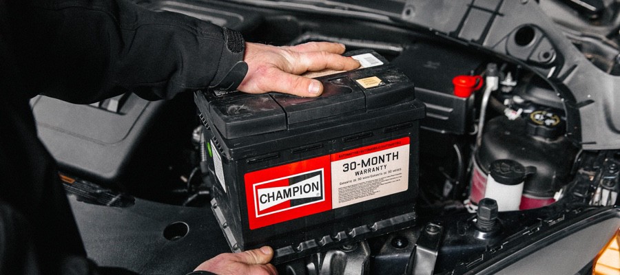 CHAM-Mechanic-Installing-Car-Battery