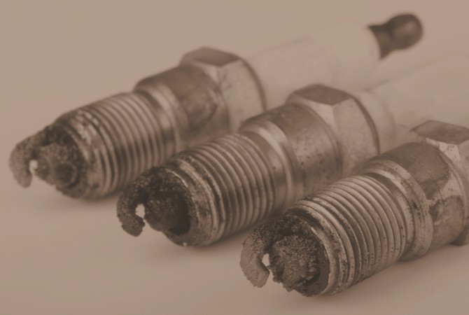 overheated-spark-plugs The end of spark plugs that have overheated and become burnt