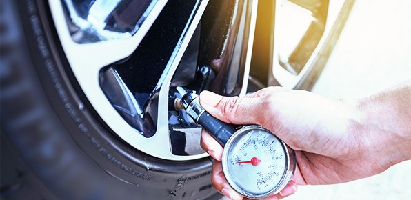 Checking-Tire-Pressure Checking-Tire-Pressure