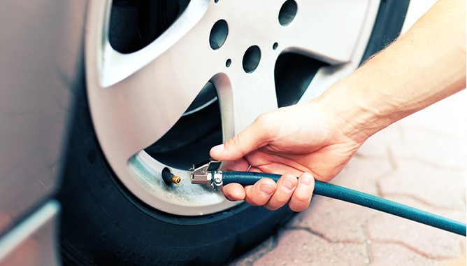 Driving-Adding-Air-To-Tire Driving-Adding-Air-To-Tire
