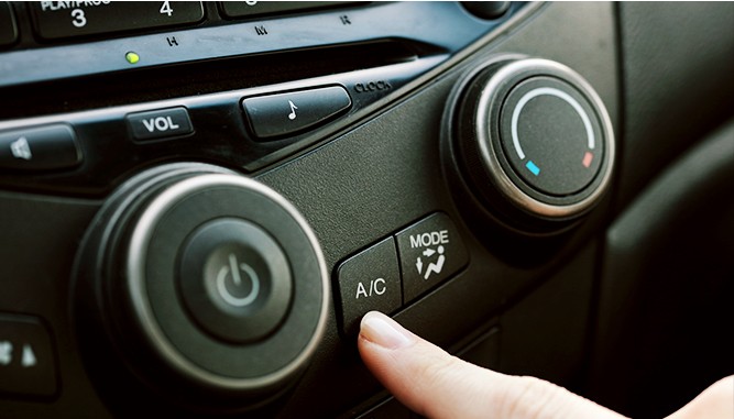 Driver-Pushing-AC-Button Driver-Pushing-AC-Button