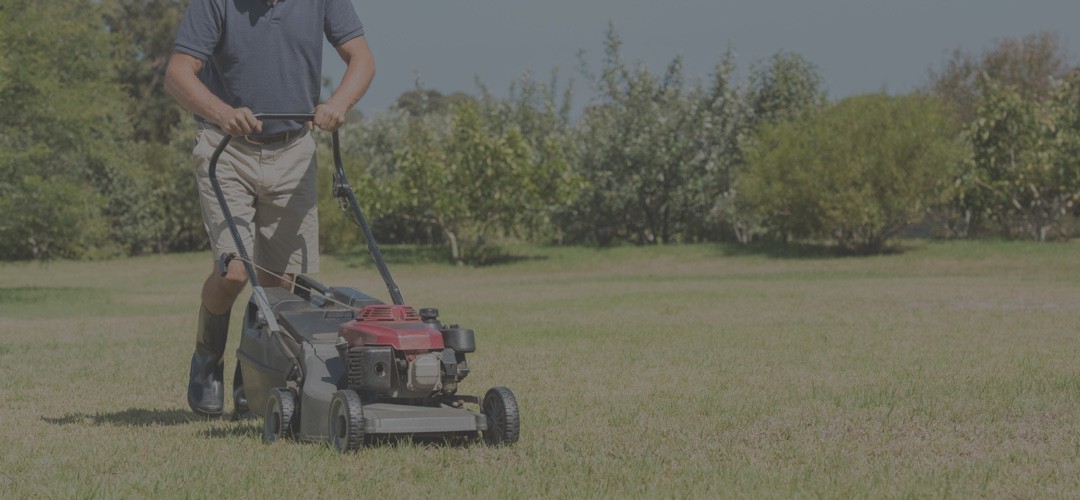 Man-Pushing-Lawn-Mower-Hero